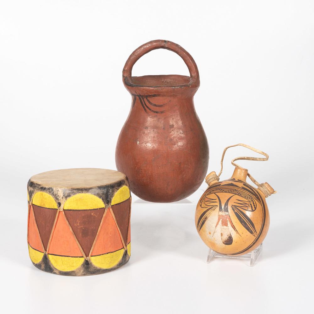 Hopi Pottery Canteen PLUS: lot of 3, includes a Pueblo drum painted in colors of yellow, dark red, and light red; 7.5 x 6 x 5.5 in.; PLUS a Hopi canteen decorated with geometric design in colors of burnt orange and black, leath