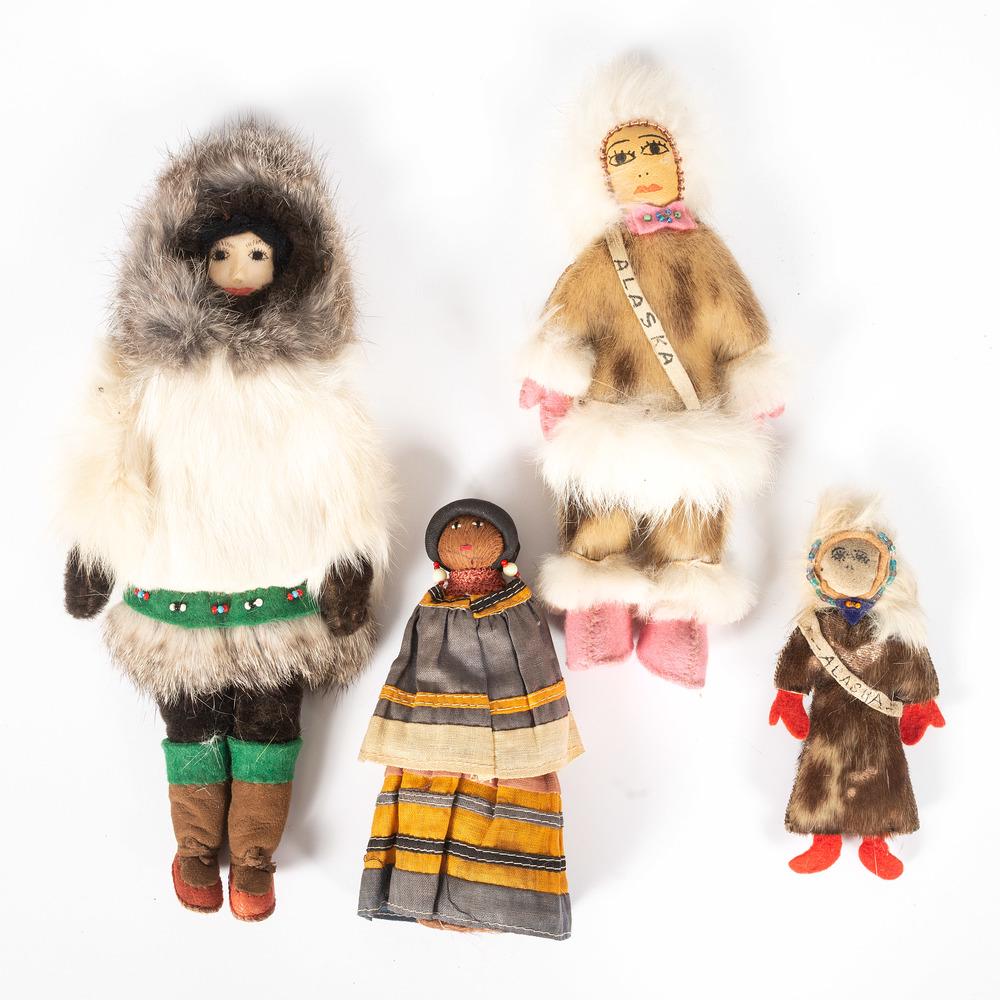 Collection of Dolls: lot of 4, includes an Inuit doll wearing a rabbit fur parka, height 9.75 in.; PLUS an Inuit doll wearing rabbit fur and sealskin parka with a sash that reads Alaska, height 8.5 in.; PLUS an Inuit dol