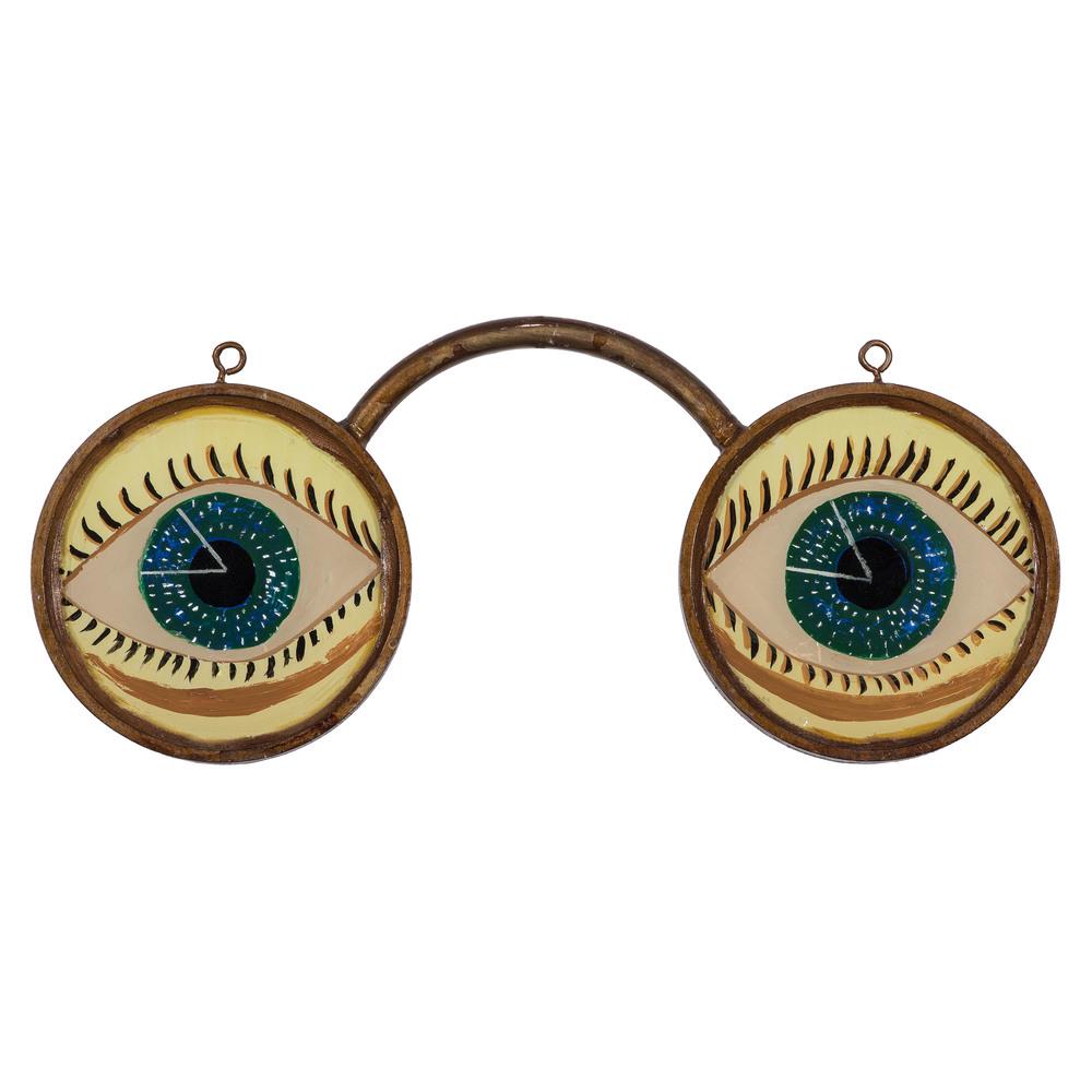 A Metal and Reverse Painted and Foil Decorated Glass: A Metal and Reverse Painted and Foil Decorated Glass Optician Trade Sign Early 20th Century two-sided with blue eyes on one side and green eyes on the reverse. Height 9 x width 23 inches.