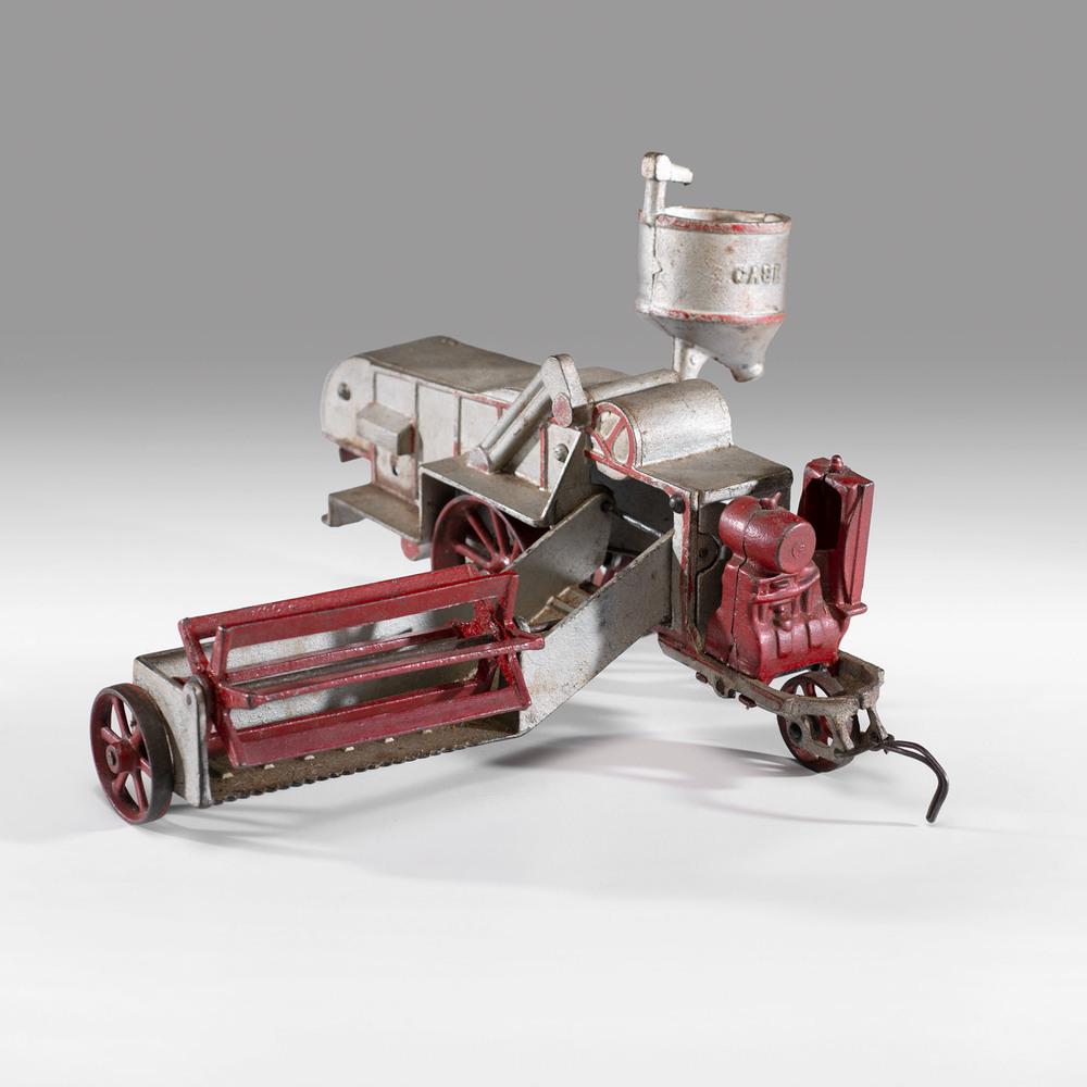 A Vindex Cast Iron Case Combine: A Vindex Cast Iron Case Combine Height 7 x length 12 inches.