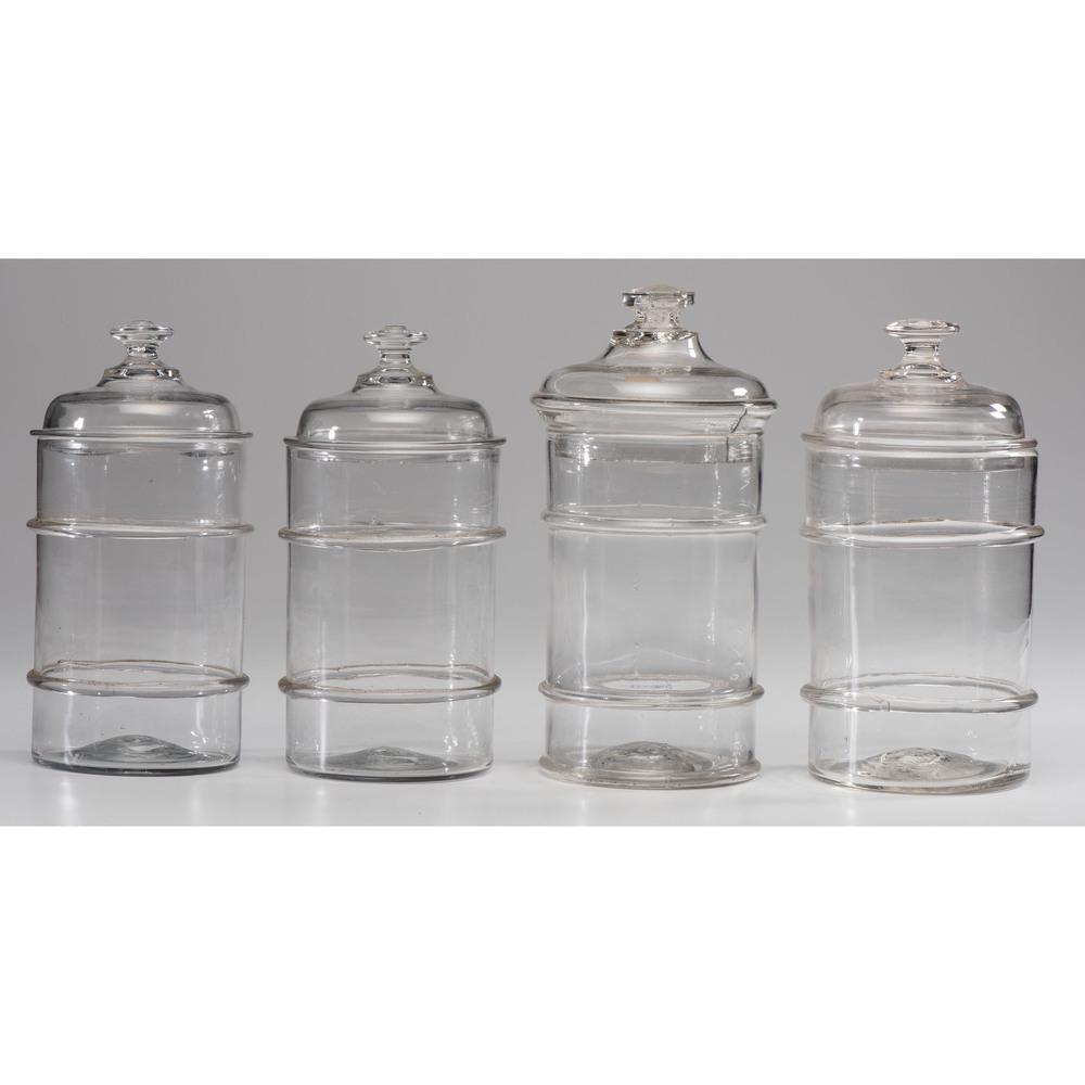 Four Blown Glass Jars: Four Blown Glass Jars 19th Century Height of largest 11 1/4 inches.