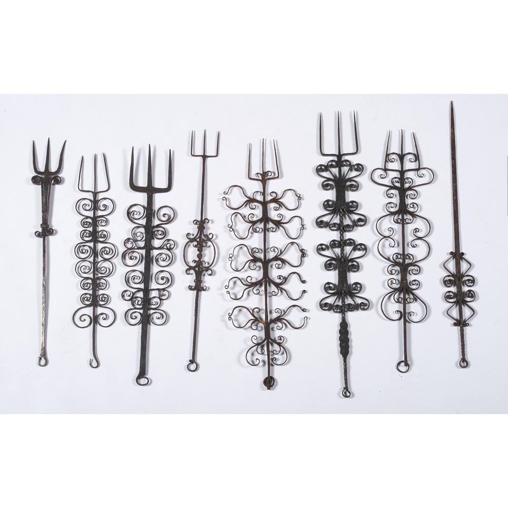 Fourteen Wrought Iron Butcher's Forks and Hooks: Fourteen Wrought Iron Butcher's Forks and Hooks 19th Century Length of largest 26 1/2 x width 4 inches.