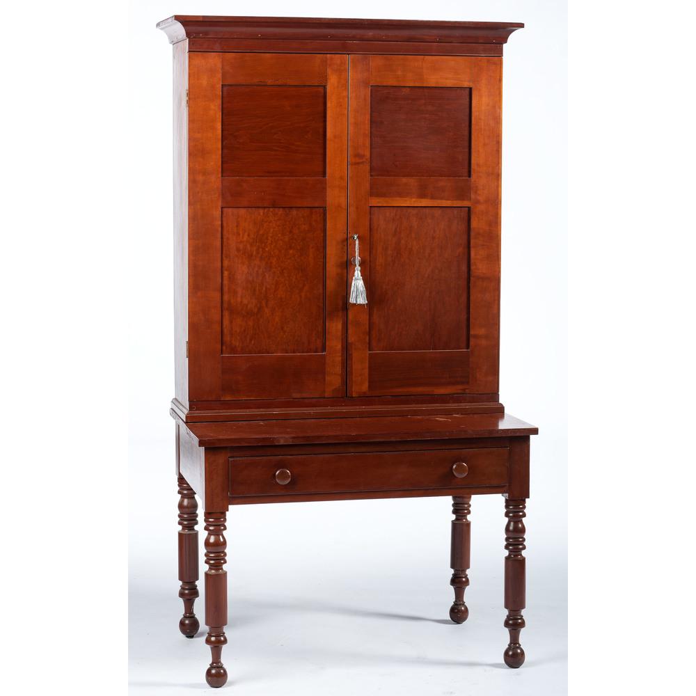 A Cherrywood Plantation Desk: A Cherrywood Plantation Desk 19th Century Height 76 1/4 x width 42 x depth 26 1/2 inches.