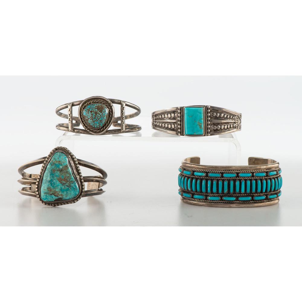 Navajo Silver and Turquoise Cuff Bracelets: lot of 4, includes a silver cuff set with turquoise petit point clusters; marked F.M. BEGAY NAVAJO Sterling, cuff width 1 in., interior circumference 5.5 in. x gap length 1.25 in., weight 34.6 dwt.; P