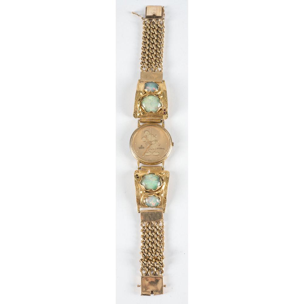 Effie Calavaza (Zuni, b.1928) 18k Gold and Opal Snake (1 of 3)