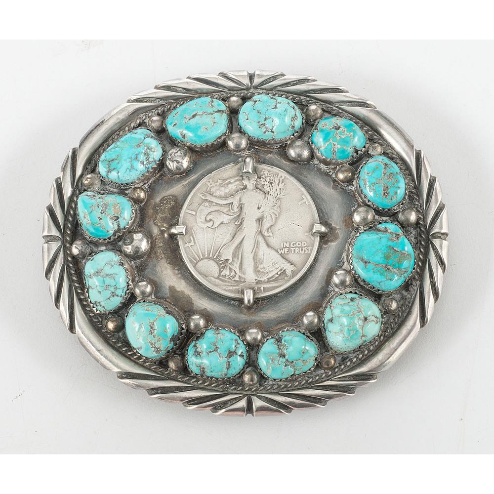 Southwestern Style Turquoise and Liberty Half Dollar: Southwestern Style Turquoise and Liberty Half Dollar Belt Buckle silver belt buckle set with turquoise nuggets around a Liberty Half Dollar; not marked; length 3.5 in. x width 3 in., weight 65.6 dwt.