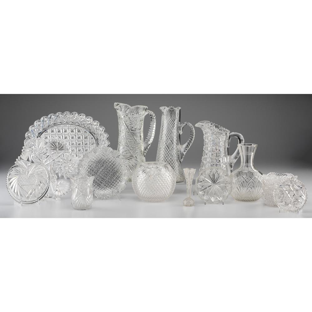A Group of Cut Glass Vases, Pitchers and Other: A Group of Cut Glass Vases, Pitchers and Other Tablewares American, 19th/20th Century eighteen pieces. Height of largest 12 inches.