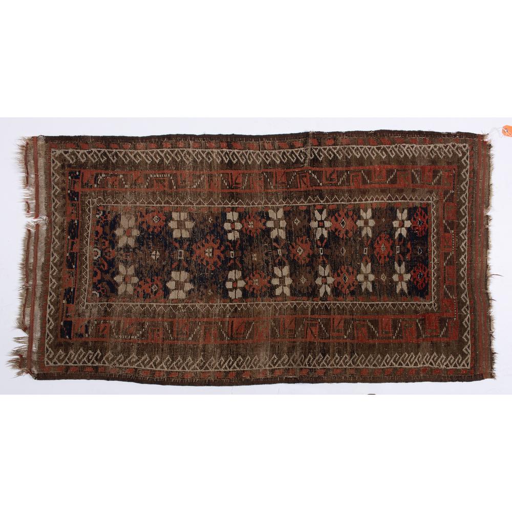 A Tribal Wool Rug: A Tribal Wool Rug 20th Century 56 x 30 3/4 inches. Provenance: Property from the Estate of Mildred Martin Buster, Audubon Farm, Midway, Kentucky