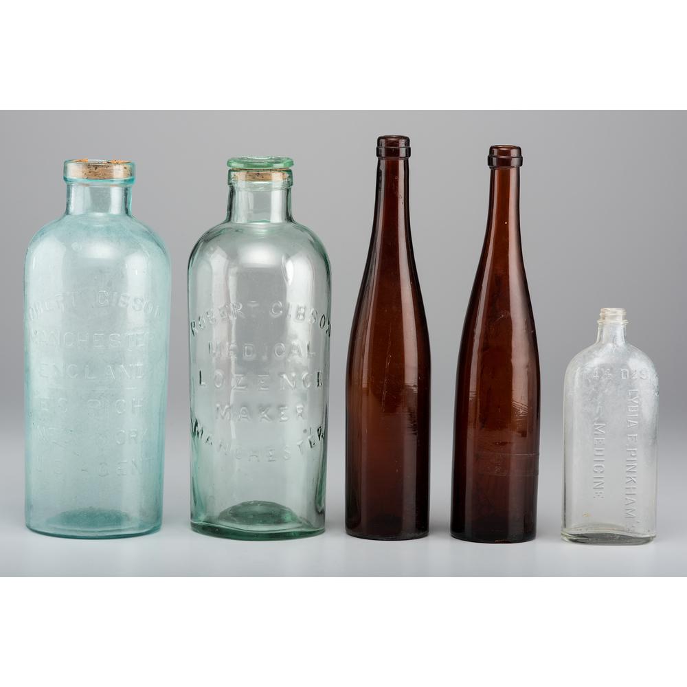 A Group of Glass Medicinal Bottles Including Robert: A Group of Glass Medicinal Bottles Including Robert Gibson 19th/Early 20th Century five bottles in total. Height of largest 13 inches.