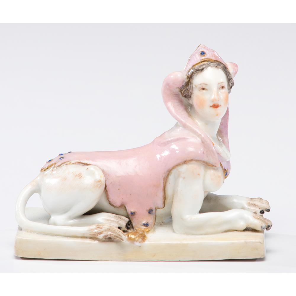 A Meissen Porcelain Recumbent Sphinx: A Meissen Porcelain Recumbent Sphinx German, 18th Century blue underglaze crossed swords mark on base. Height 2 3/4 x length 3 1/4 inches.