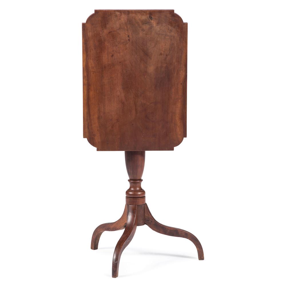 A Federal Tilt Top Table in Cherry: A Federal Tilt Top Table in Cherry American, 19th Century Height 30 x width 21 1/2 x depth 16 inches.
