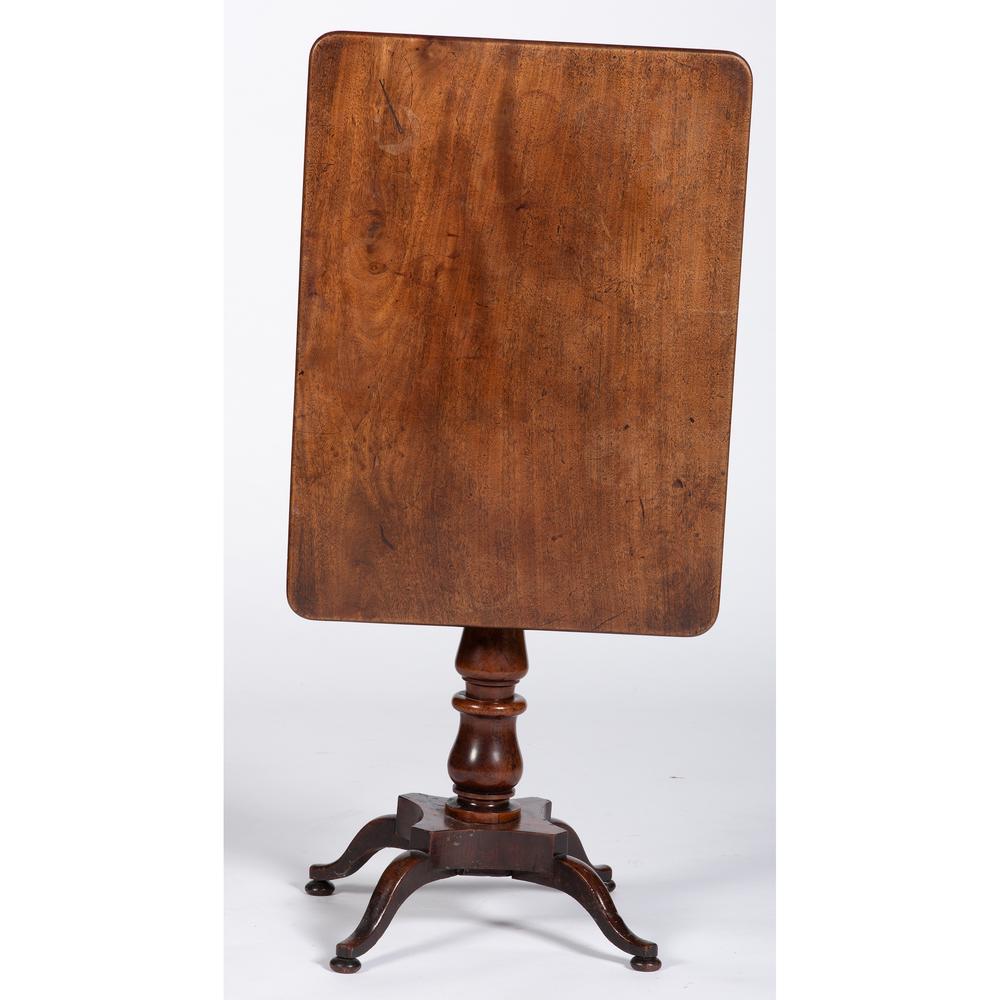An American Late Classical Tilt Top Table: An American Late Classical Tilt Top Table 19th Century Height 27 3/4 x width 28 3/4 x depth 21 1/4 inches.