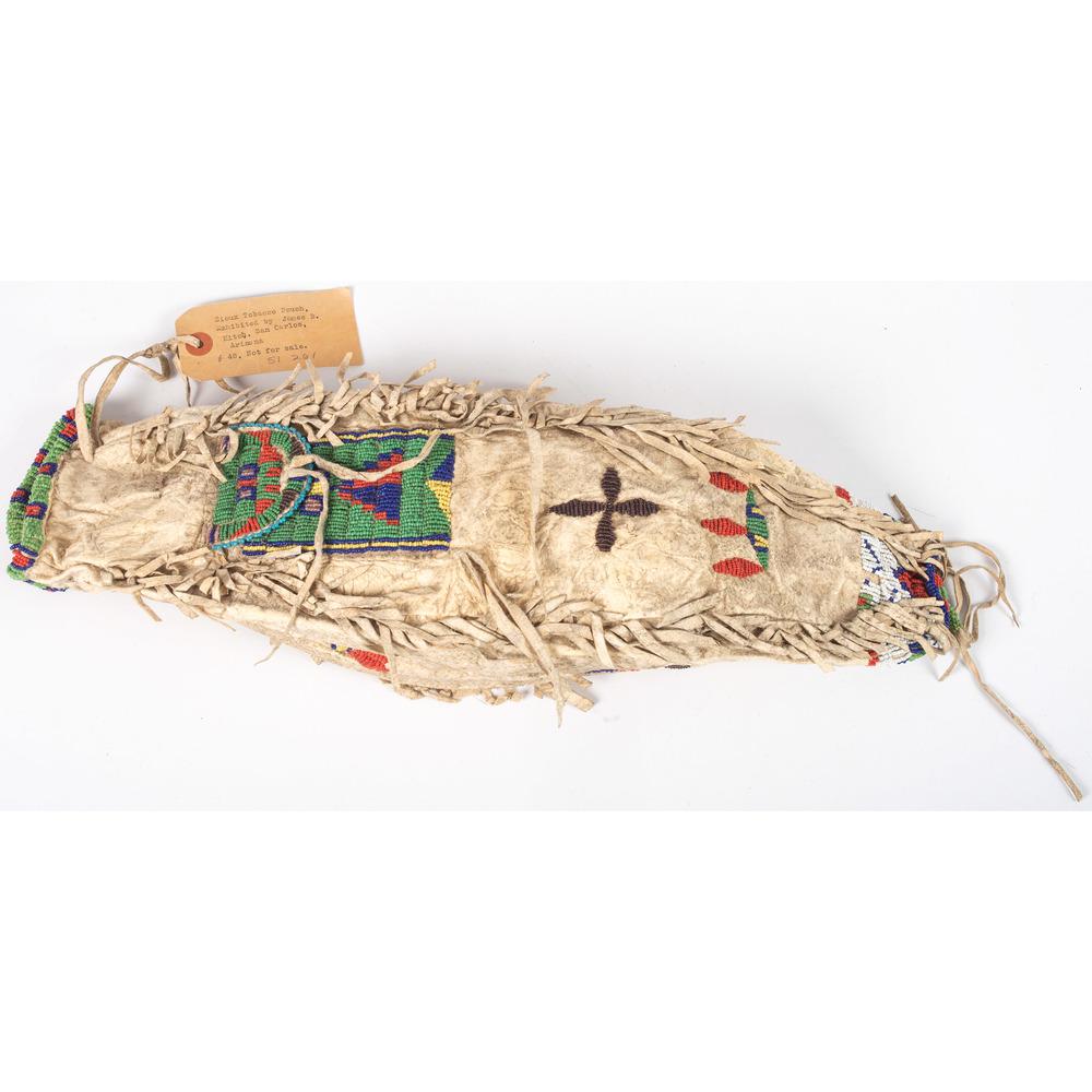 Sioux Beaded Hide Bag, From the Stanley B. Slocum: Sioux Beaded Hide Bag, From the Stanley B. Slocum Collection, Minnesota sinew-sewn and beaded using colors of red, pea green, white, blue, and greasy yellow; with floral design elements; beaded front 