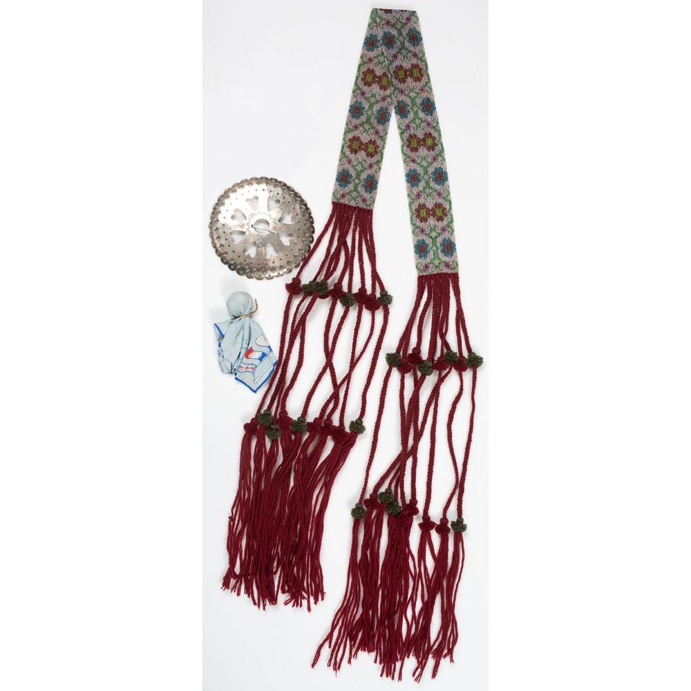 Osage Loom Beaded Belt and German Silver Brooch, PLUS: Osage Loom Beaded Belt and German Silver Brooch, PLUS lot of 3, includes a loom beaded belt with colorful floral design and red yarn tassels; length 70.5 in.; PLUS a large circular brooch with scallop