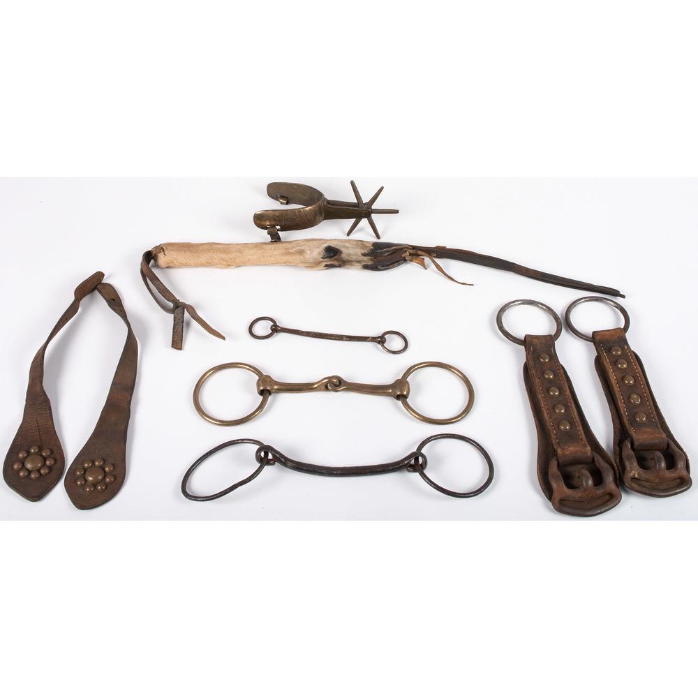 Assorted Horse Tack, From the Stanley B. Slocum: Assorted Horse Tack, From the Stanley B. Slocum Collection, Minnesota lot of seven, includes one single brass spur with six 1.5 in. points; PLUS three bits, of which one is brass; PLUS two matching st
