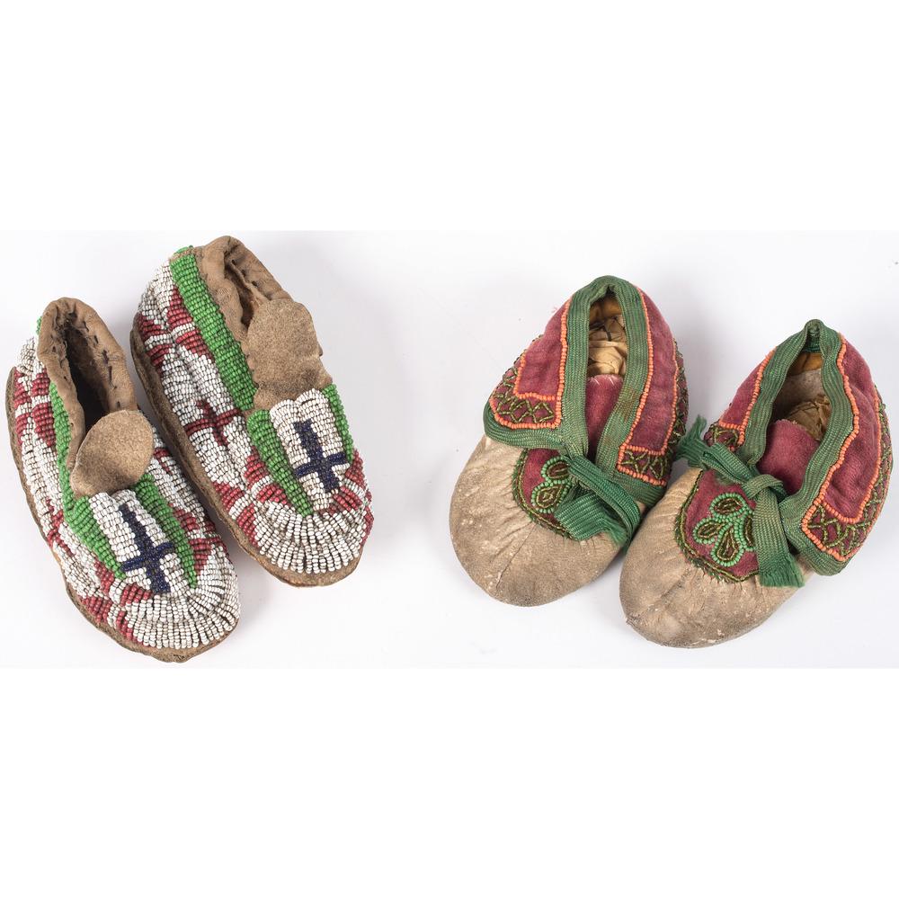 Toddler Beaded Hide Moccasins: lot of 2, includes a Sioux pair of thread and sinew-sewn moccasins; beaded in colors of red white-heart, cobalt, white, and pea green, length 5.5 in.; AND a pair of from the northeast, thread-sewn wi
