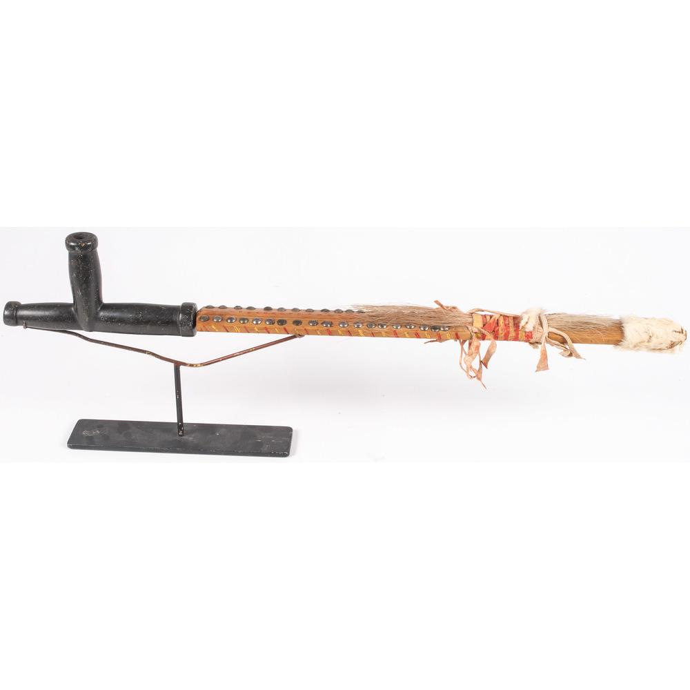 Blackfoot Steatite Pipe Bowl with Wood Stem, From the: Blackfoot Steatite Pipe Bowl with Wood Stem, From the Stanley B. Slocum Collection, Minnesota T-shaped steatite pipe bowl with flat base; painted pipe stem with steel tack decorations and ermine, buck