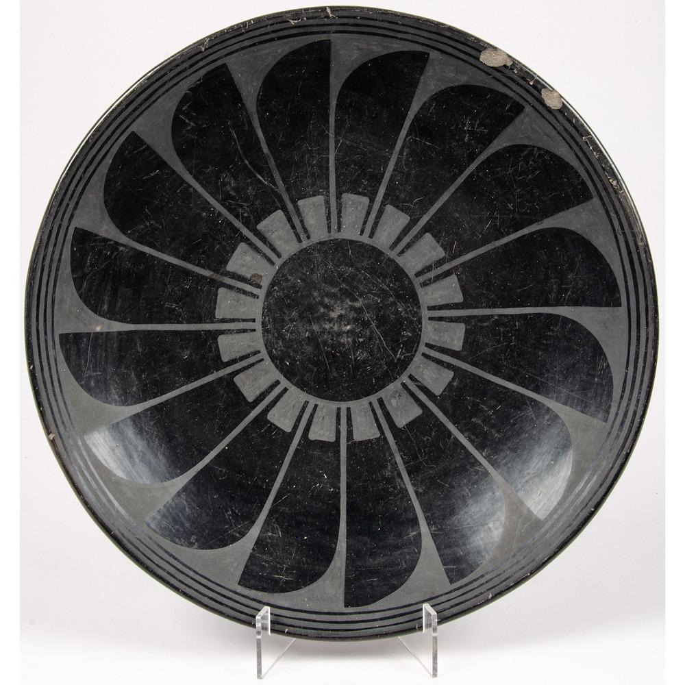 Maria and Julian Martinez (San Ildefonso, 1887-1980 /: Maria and Julian Martinez (San Ildefonso, 1887-1980 / 1885-1943) Blackware Pottery Plate with repeating feather design; signed on base Marie + Julian, height 1.75 in. x diameter 14.25 in. 1925-1943