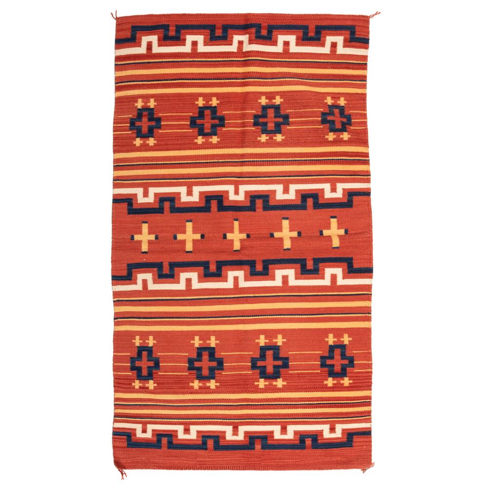 Navajo Child's Late Classic Revival Blanket / Rug, From: Navajo Child's Late Classic Revival Blanket / Rug, From the Collection of Robert B. Riley, Illinois hand-spun wool woven using colors of red, gold, cream, and indigo; design of crosses and crenelated 
