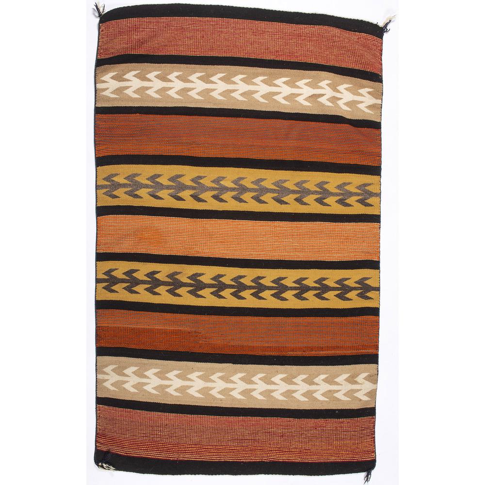 Navajo Regional Weaving / Rug: woven using an autumnal color palette with a banded design featuring corn stalks and a twill weave, 42 x 67 in. second quarter 20th century