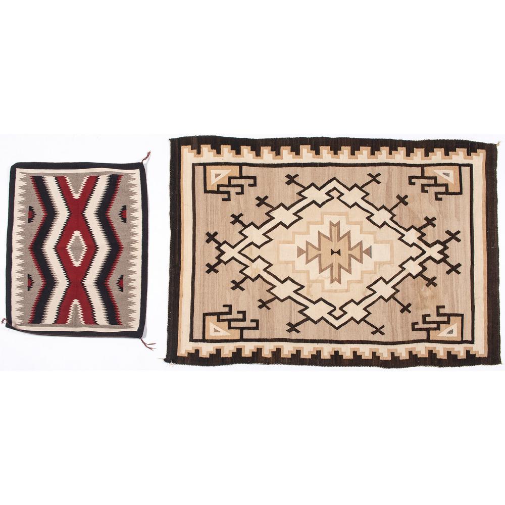 Navajo Regional Weavings / Rugs: lot of two, includes one Eastern weaving with a central diamond design and created using neutral colors, 39 in. x 55.5 in.; AND small Western throw created using colors of red, navy blue, cream and gr