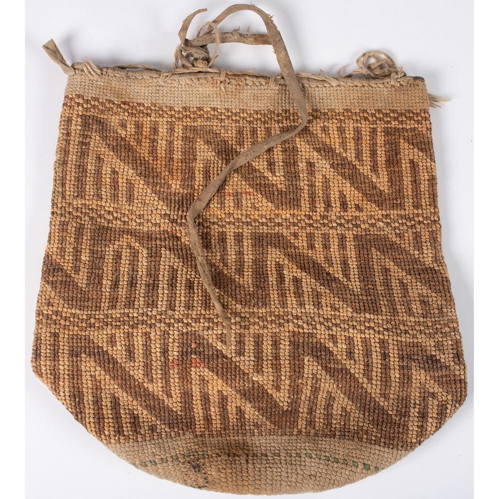 Plateau Cornhusk Bag, From the Stanley B. Slocum: Plateau Cornhusk Bag, From the Stanley B. Slocum Collection, Minnesota bag with elkhide lacing, length 14 in. ca 1900