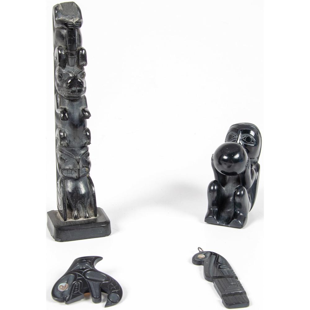 Calvin Bell and Greg Lightbrown (Haida, b. 1950 and b.: Calvin Bell and Greg Lightbrown (Haida, b. 1950 and b. 1953) Argillite Carvings, PLUS lot of 4, includes a model totem pole with "Qn Charlotte Ilds B.C" on verso, height 6.25 in.; PLUS a figural carv