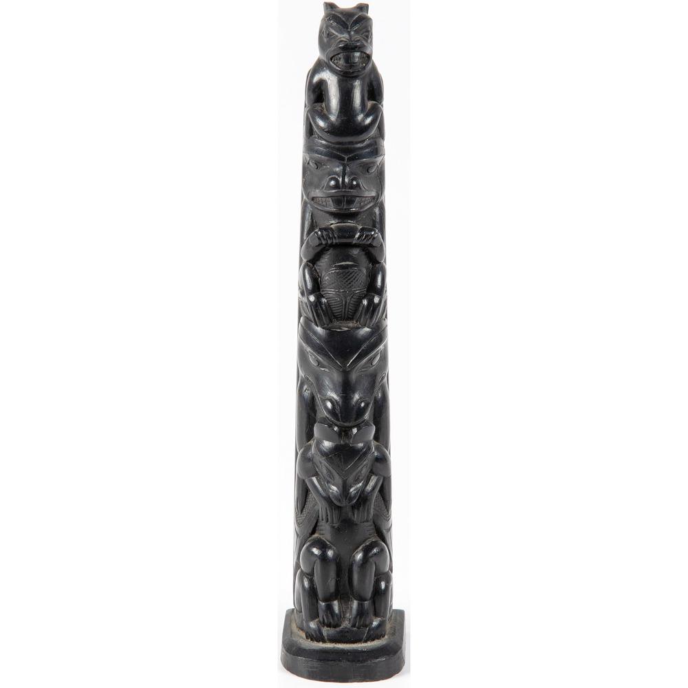 Haida Carved Argillite Model Totem Pole: totem pole carved with four figures; height 10.25 in. dated on base 1850