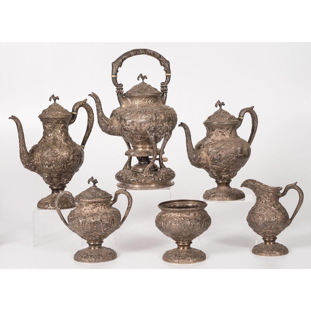 A Loring Andrews Repoussé Castle Pattern Silver Coffee: A Loring Andrews Repoussé Castle Pattern Silver Coffee and Tea Service American (Cincinnati), Early 20th Century a six-piece service comprising a coffee pot, tea pot, kettle on stand, covered sugar, 