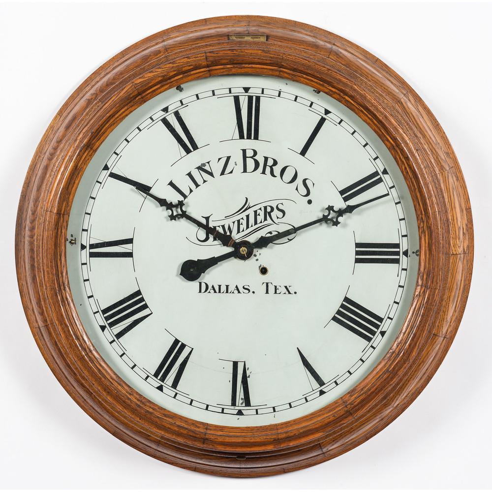 A New Haven Clock Co. Oak Gallery Clock: Early 20th Century Diameter 24 inches.