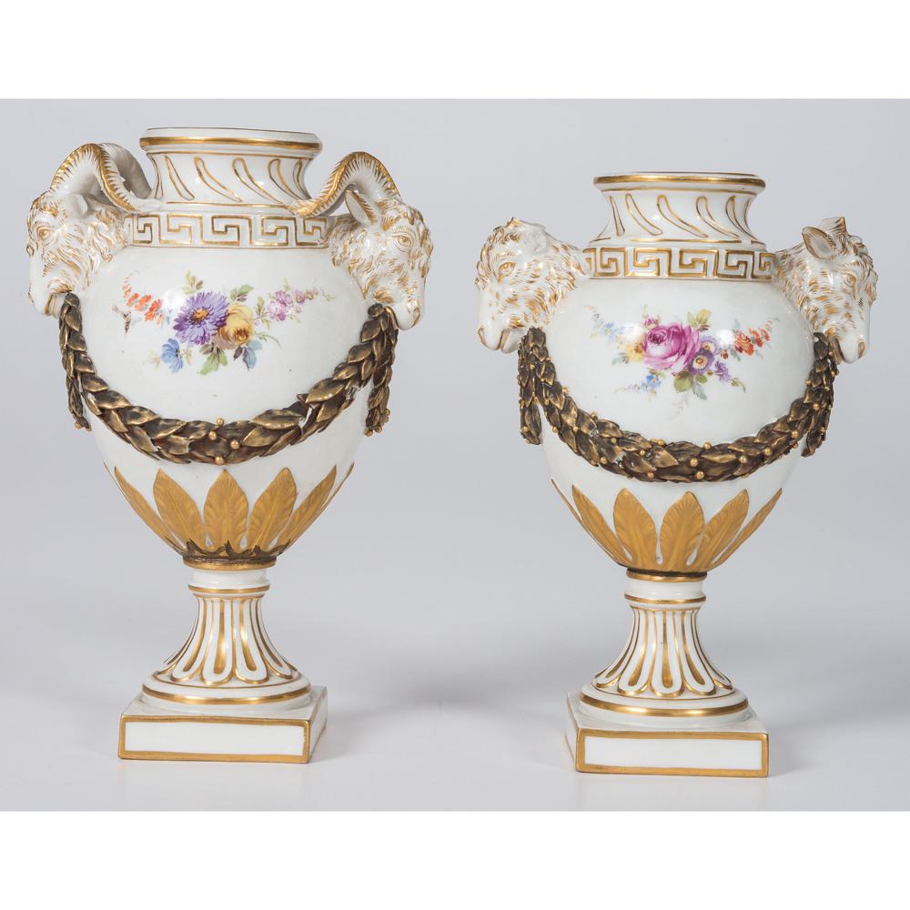 Two Meissen Porcelain Neoclassical Urns: Two Meissen Porcelain Neoclassical Urns 19th Century both with crossed swords mark on underside. Height of larger 6 1/4 inches.