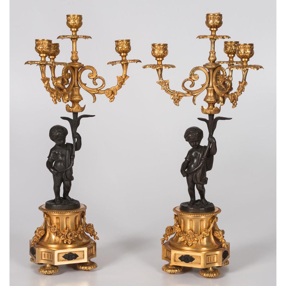 A Pair of Italian Gilt Metal Figural Candelabra: A Pair of Italian Gilt Metal Figural Candelabra Late 19th/20th Century Height 18 1/2 inches.