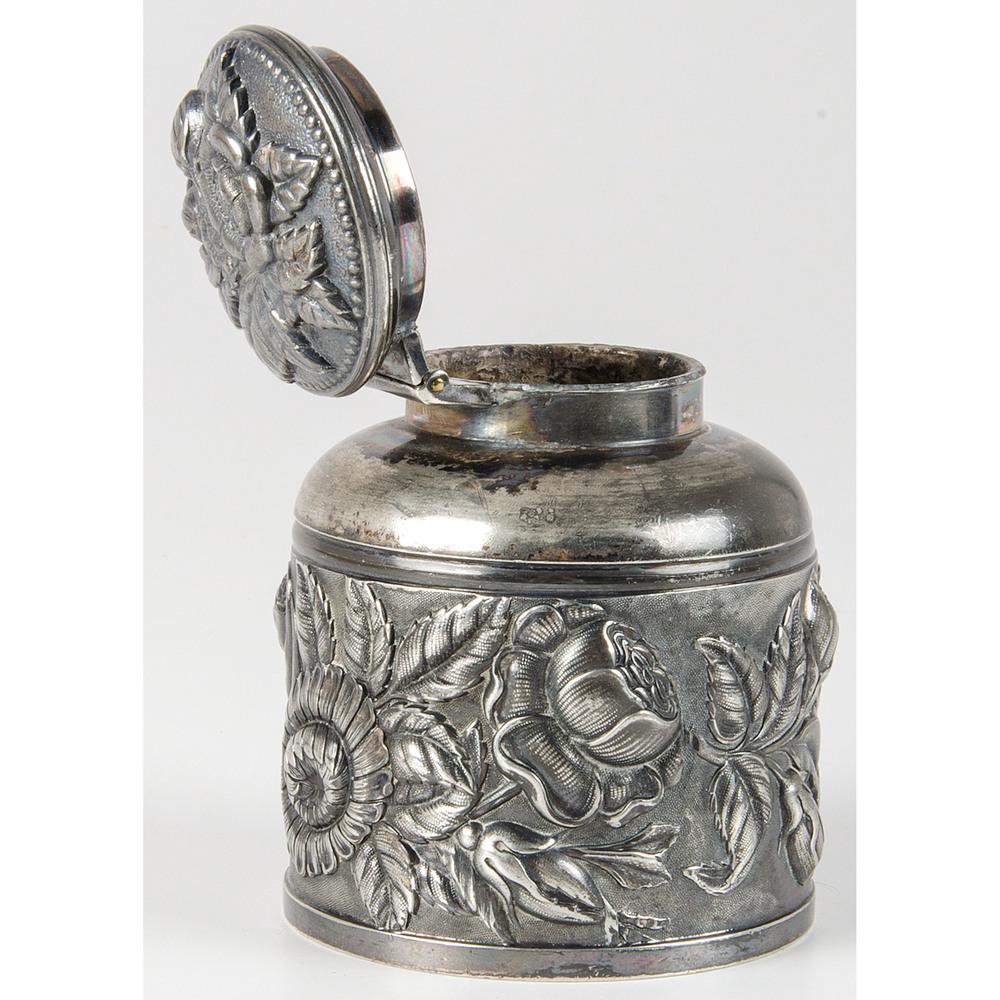 A Silver Inkwell Owned by Senator Calhoun: A Silver Inkwell Owned by Senator Calhoun 19th Century With repousse flowers and leaves, manuscript identification on pad on bottom, Inkwell Formerly Belonging to John C. Calhoun. Height 3 3/4 x diame