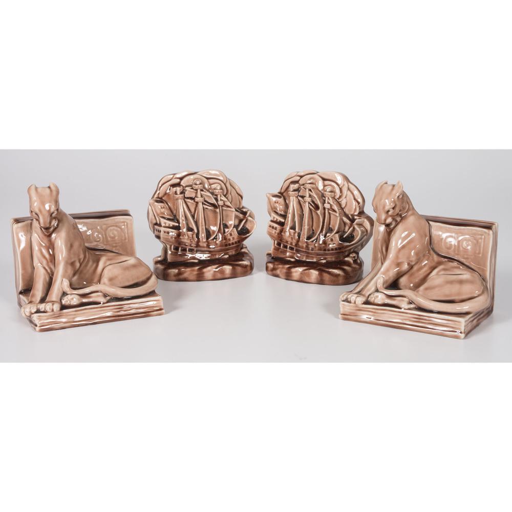 A Pair of Rookwood Pottery Panther and Ship Bookends: A Pair of Rookwood Pottery Panther and Ship Bookends 1944 each with factory and date mark, and William McDonald monogram. ship with pattern no. 2694 and panther 2564. Height of panther 5 1/2 inches. H
