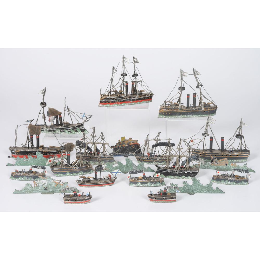 A Group of Miniature Painted Tin and Lead Battleships: A Group of Miniature Painted Tin and Lead Battleships Early 20th Century (pre-WW I) a group of twenty. Height of largest 5 3/4 inches.