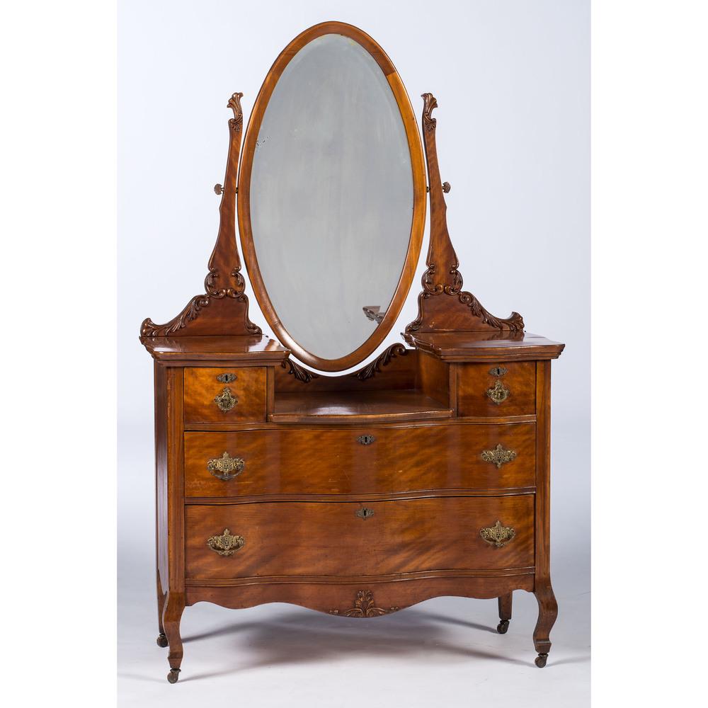 A French-style Dressing Table with Mirror in Mahogany: A French-style Dressing Table with Mirror in Mahogany American, 20th Century with pivoting mirror. Height 70 x width 44 1/2 x depth 21 inches.