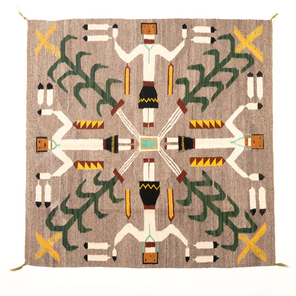 Navajo Pictorial Weaving / Rug: woven of handspun wool in colors of green, yellow, maroon, browns, blue, cream, and gray; depicting Yei figures and corn stalks, 45 x 45.5 in. mid-20th century