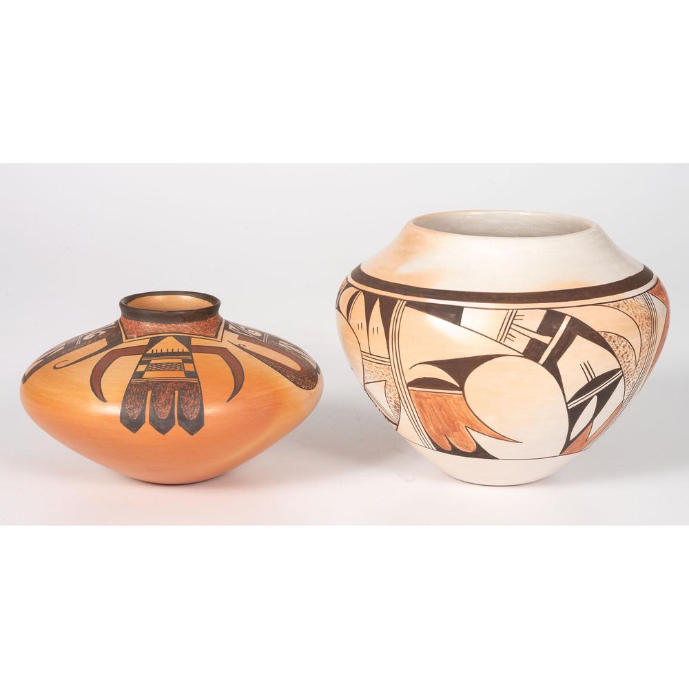 Joy Navasie (Hopi, 1919-2012) and Charles Navasie (b.: Joy Navasie (Hopi, 1919-2012) and Charles Navasie (b. 1965) Pottery lot of 2, includes a jar by Joy Navasie, decorated with winged elements and hallmarked on base, height 5.5 in. x diameter 6.75 in.;
