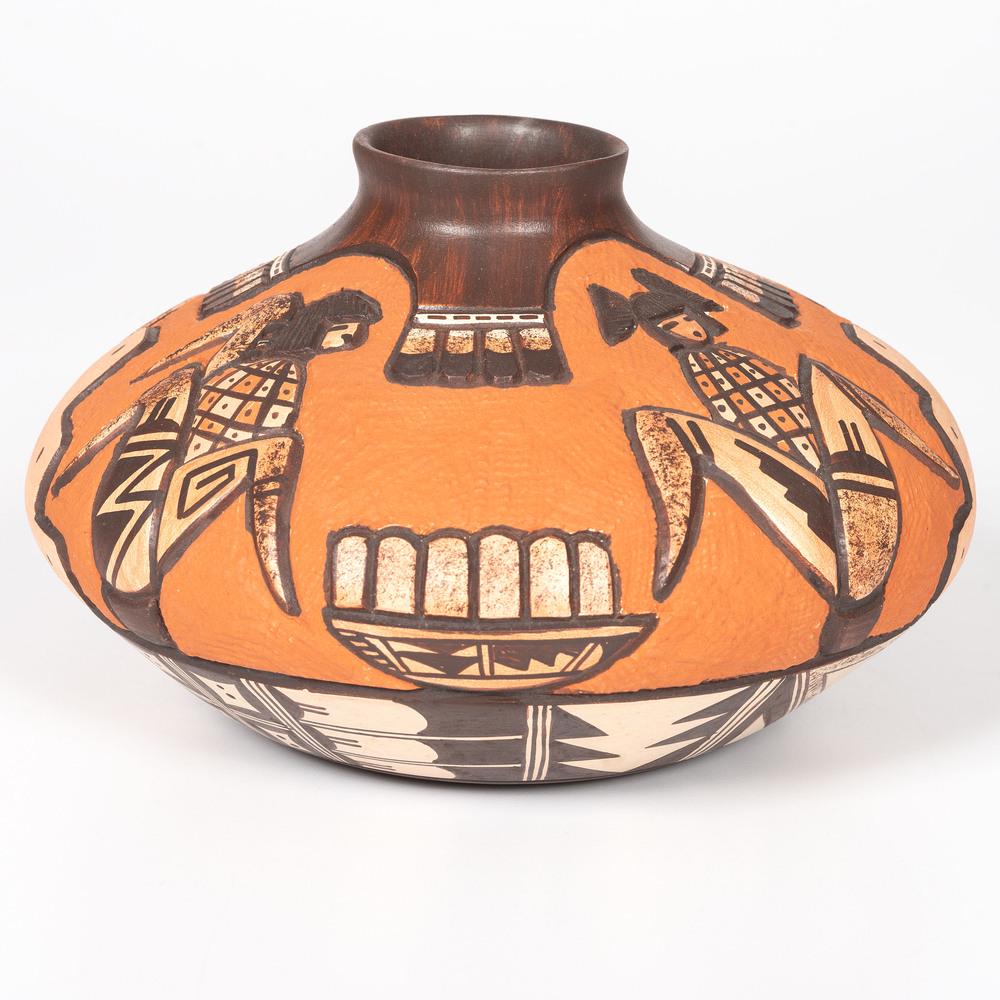 Carla Nampeyo (Hopi, b. 1961) Carved Pottery Jar: provocative imagery of emerging Corn Maidens; decorated and signed on base, height 5.25 in. x diameter 8.25 in. ca 2000