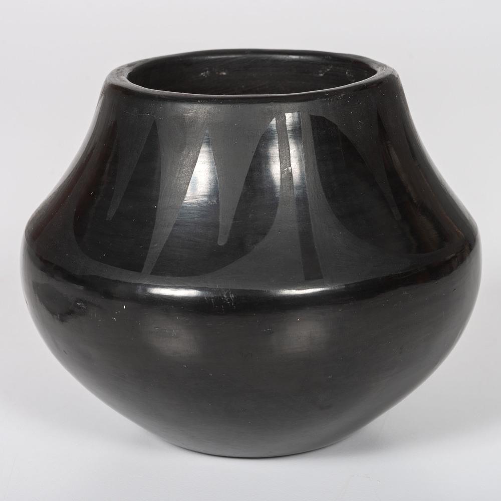 San Ildefonso Pottery Jar: shoulder painted with winged elements; although signed on base Marie and Julian, this was possibly crafted by Clara Martinez, daughter-in-law of Maria, height 4.25 in. x diameter 5.25 in.