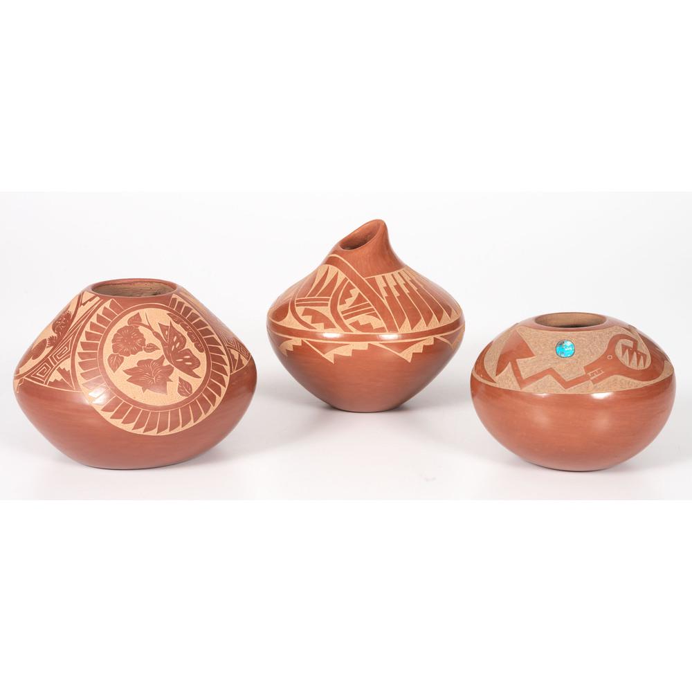 San Ildefonso and Jemez Sgraffito Pottery: lot of 3, includes a jar with repeating feathers by Ida Yepa; signed on base, height 4.75 in. x diameter 5.25 in.; PLUS a jar by Brenda Tafoya; designed with vignettes of squirrels, butterflies, owls
