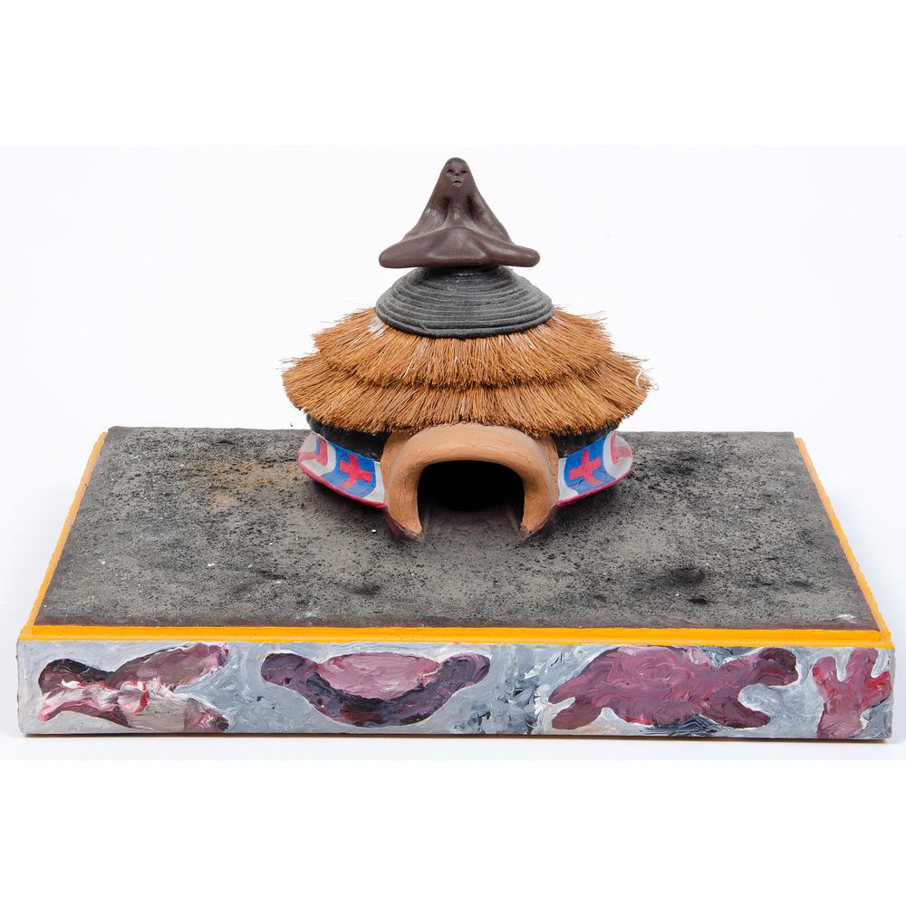 Aboudramane (Senegalese, b. 1961) Sculpture with Straw,: Aboudramane (Senegalese, b. 1961) Sculpture with Straw, From the Collection of Robert B. Riley, Urbana, IL. Le Porteur depiction of home with straw roof in colors of brown, gold, yellow, blue, and pin