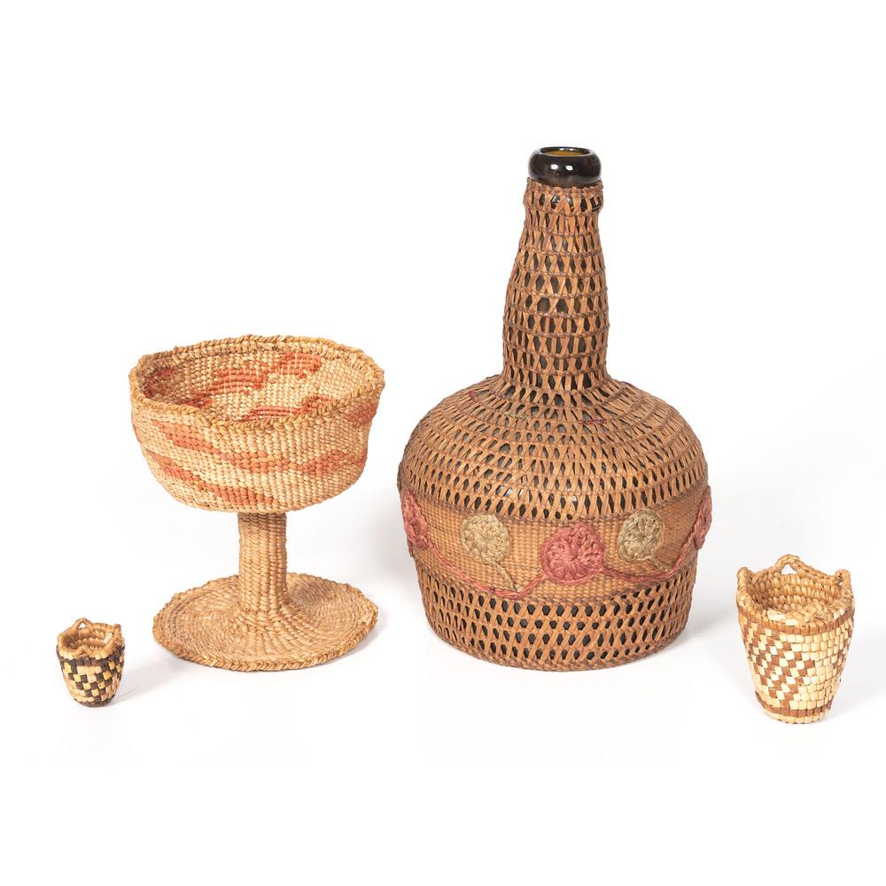 Pacific Northwest Baskets: lot of 4, includes a Chehalis chalice, height 4.5 in. x diameter 4.25 in.; PLUS a wine bottle covered with Tlingit basketry, height 8 in. x diameter 4.25 in.; PLUS two miniature Klickitat baskets, he