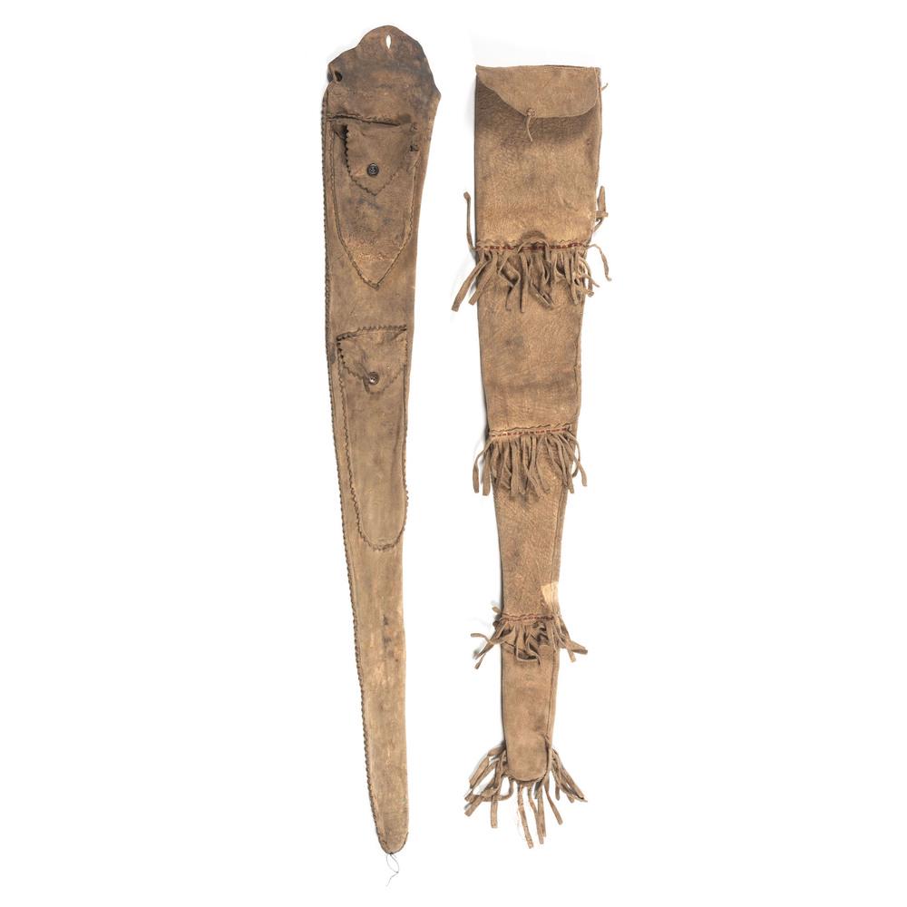 Northern Plains Rifle Scabbards, Deaccessioned from the: Northern Plains Rifle Scabbards, Deaccessioned from the Museum of the Fur Trade, Nebraska lot of two rifle scabbards thread-sewn on thick hide, one featuring pockets with button fasteners; longest len