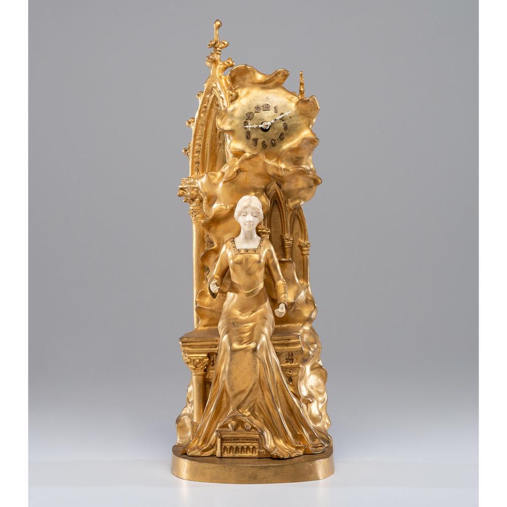 A French Gilt Bronze and Bone Mantel Clock After Xavier: A French Gilt Bronze and Bone Mantel Clock After Xavier Raphanel (1876-1957) 20th Century signed on base. Height 20 inches.