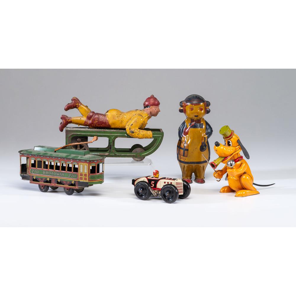 Five Tin Lithograph and Painted Toys: Five Tin Lithograph and Painted Toys 20th Century including a Lindstrom wind-up Betty toy, a J. Chein Broadway trolley, a Marx racecar, a LineMar Pluto wind-up toy, and a painted tin boy on a sled.