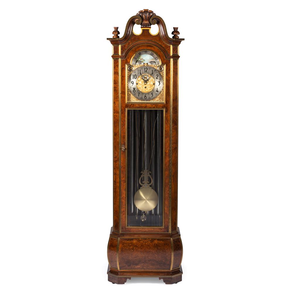 A Herschede Clock Co. Model 250 Nine Tube Tall Case: A Herschede Clock Co. Model 250 Nine Tube Tall Case Clock 20th Century having a burl walnut case. dial marked, plaque label to door interior. Height 87 1/4 x width 24 1/4 x depth 14 inches.