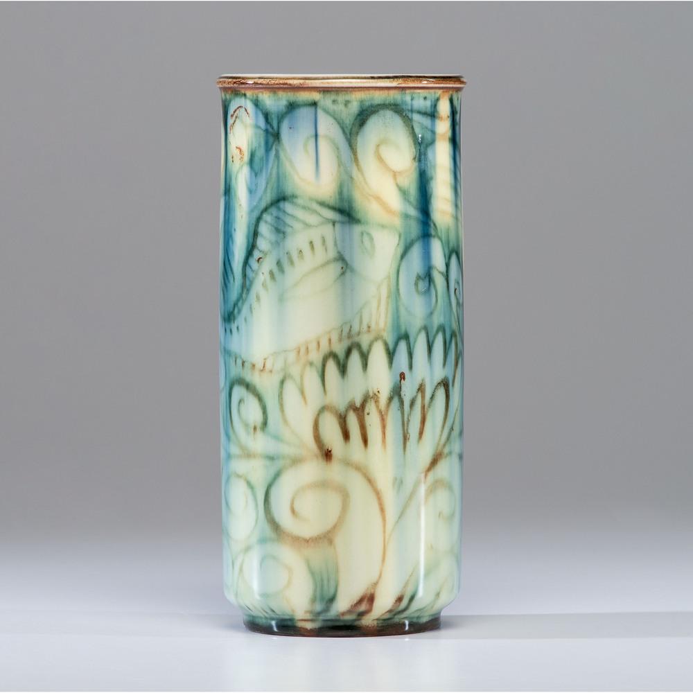 A Rookwood Pottery Vase, Jens Jensen: A Rookwood Pottery Vase, Jens Jensen 1944 with factory mark and date mark, shape no. 6859 and artist cypher to underside. Height 10 1/8 inches.