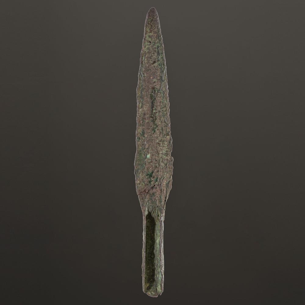 An Old Copper Culture Socketed Spear Point, 7-5/8 in.: An Old Copper Culture Socketed Spear Point, 7-5/8 in. Old Copper Culture, 7000-3000 B.C. Traverse City, Grand Traverse County, Michigan length 7-5/8 in. Provenance: From the Karl G. Parchert Collectio