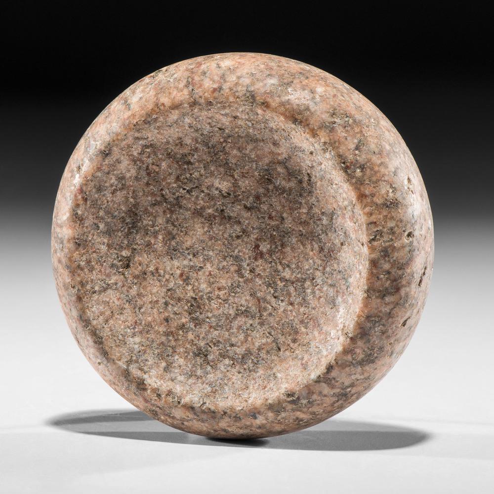 A Granite Discoidal, Diameter 4 in.: A Granite Discoidal, Diameter 4 in. Mississippian Culture, Late Prehistoric Period, A.D. 1000-1500 Madison County, Illinois diameter 4 in. Collection History Minnesota Historical Society Museum, purch